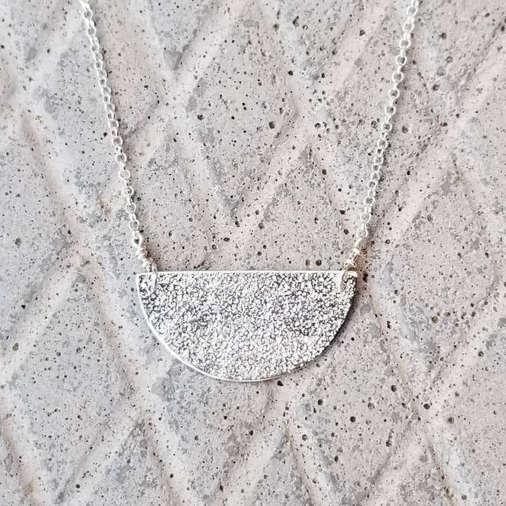 Large Half Moon Sand Pendant - Sterling Silver for wholesale by Kuriosities