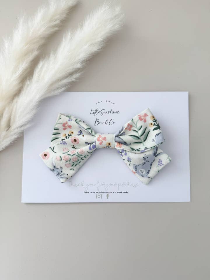 Cream Floral Bunnies Easter Pinwheel Hair Bow for wholesale by Little Sunshines Bow & Co