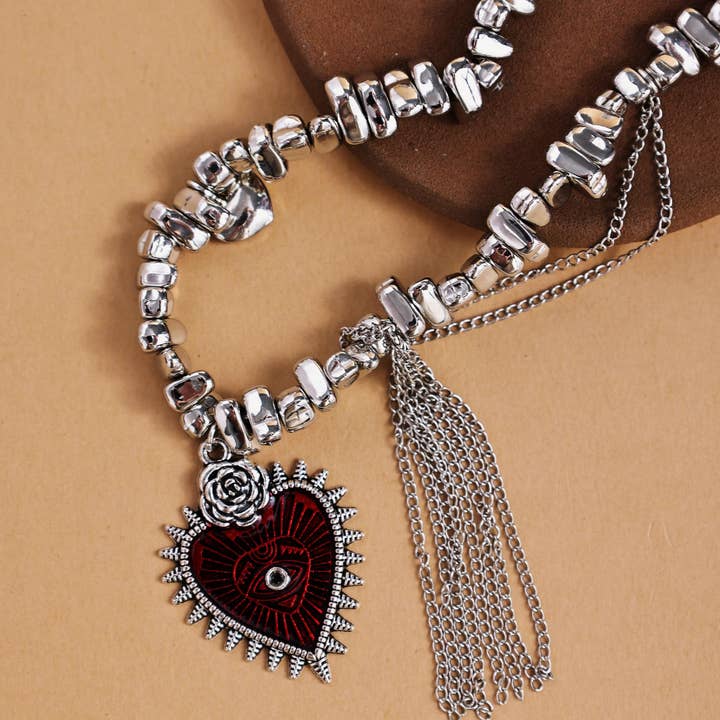 Revelari – wholesale Pendant/charm necklace – Silver Beaded Necklace with Heart Pendant and Tassel1