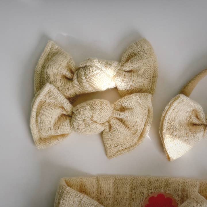 Maglione giallo burro BloomCLIPS o fascia in nylon per la vendita all'ingrosso da parte di Bloom Headwraps