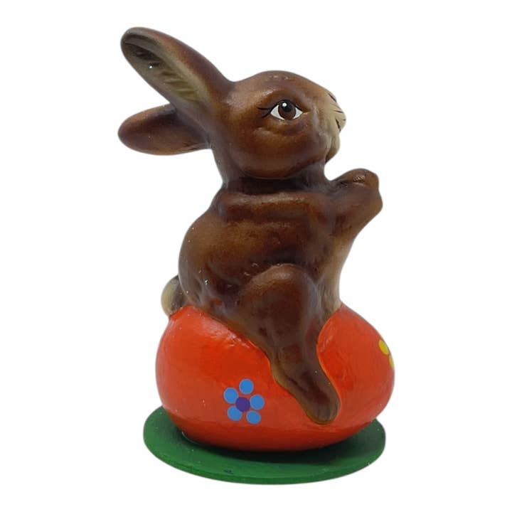 Pinnacle Peak Trading - Wholesale Decorative Figurine - Ino Schaller Easter Bunny on Orange Egg German Paper Mache