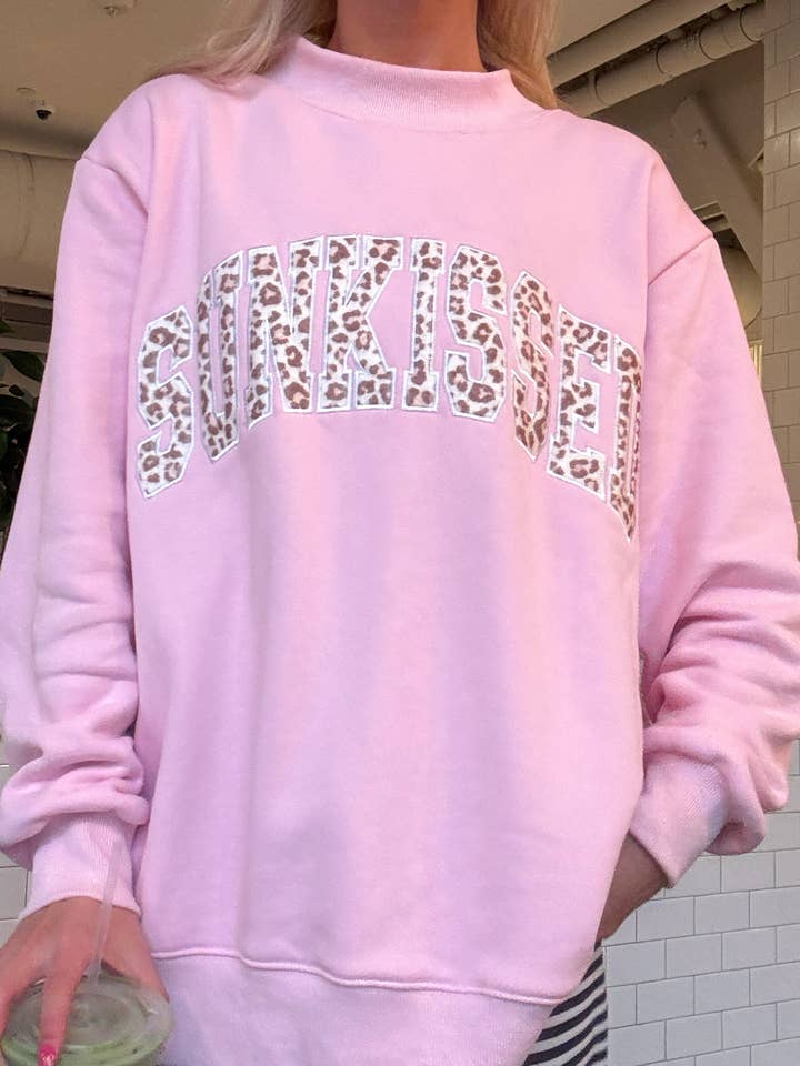 Bubblegum Pink Cheetah Print Varsity Sunkissed Embroidered Mockneck Sweatshirt 100% Cotton for wholesale on Faire