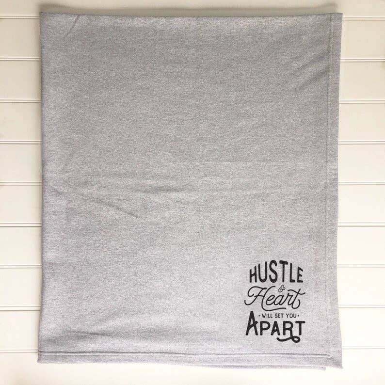 Athletic Grey Hustle and Heart Sweatshirt Blanket for wholesale on Faire1