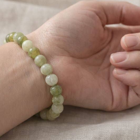 Xiuyu Jade Tumbled Bead Stretch Bracelet (8mm) for wholesale by Crystal River Gems LLC
