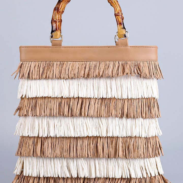 Bamboo Handle Fringe Bag and other Purchase Wholesale bamboo handle bag. Free Returns & Net 60 Terms on Faire trending on Faire.
