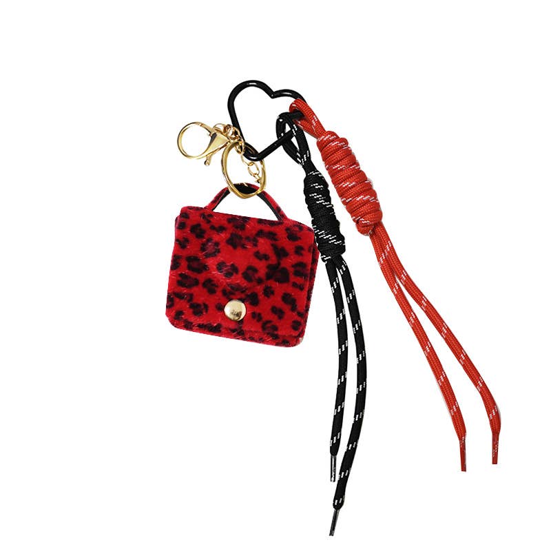 AMORINO SRL - Vendita all'ingrosso Portachiavi - Donna - PORTACHIAVI CIONDOLO BORSA IN TESSUTO LEOPARDATO3