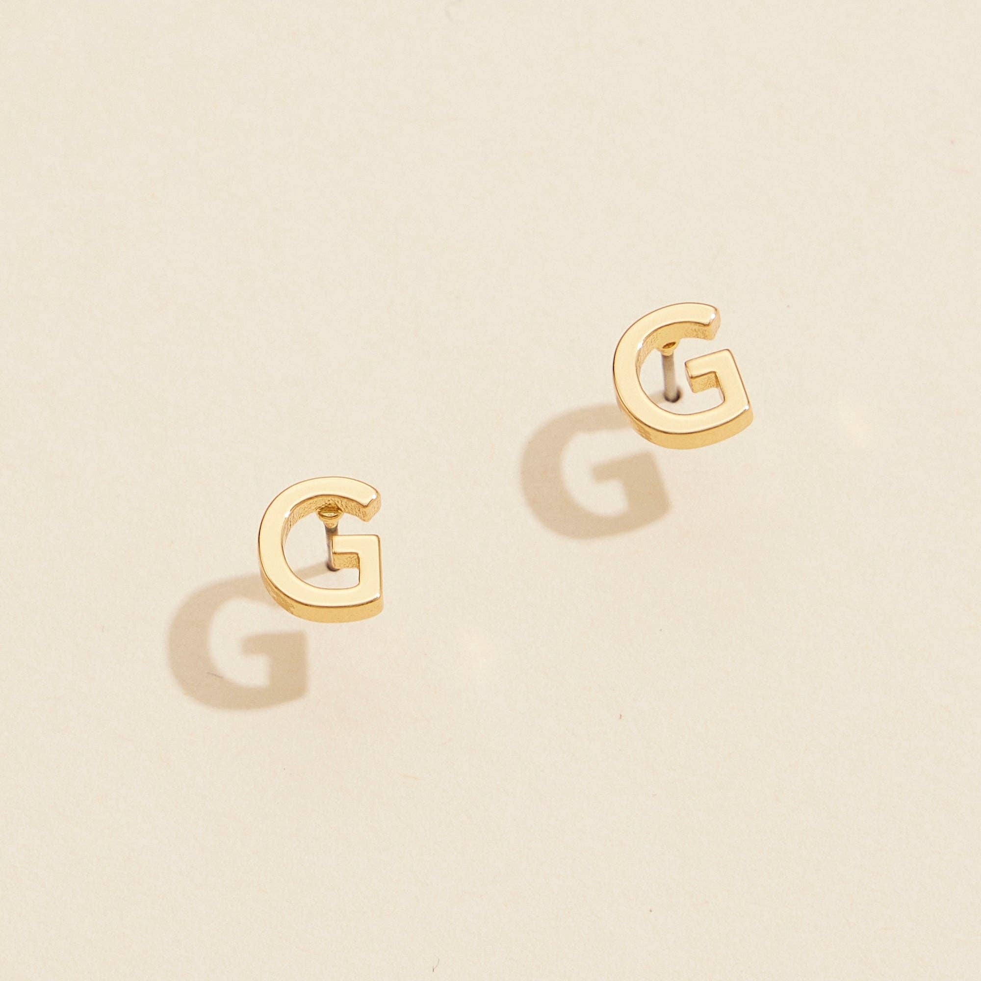  Assorted Initial Metal Stud Earrings for wholesale on Faire10