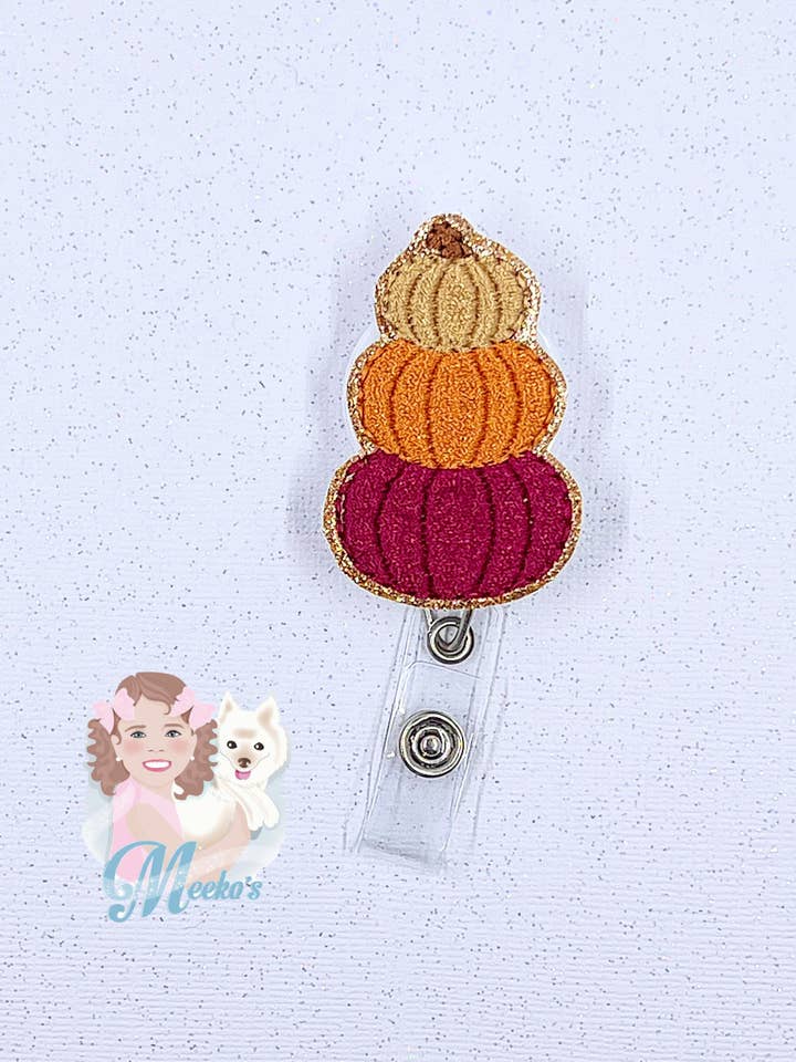 Stacked Pumpkin Halloween Nurse Teacher Autumn Badge Reel for wholesale by Meeko’s Must Haves
