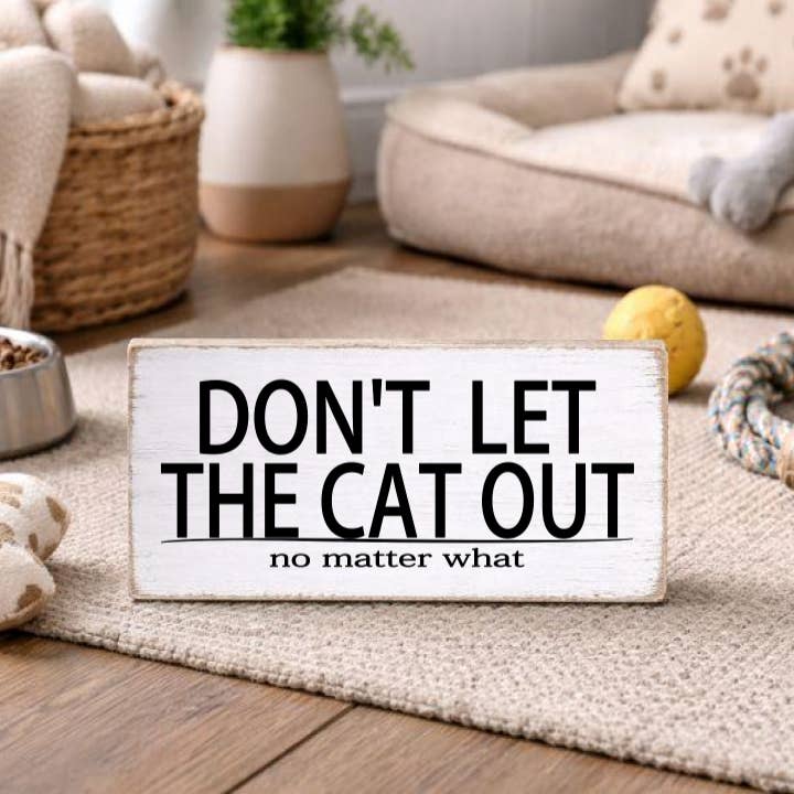 DON'T LET THE CAT OUT NO MATTER WHAT for wholesale by Dudley's Cottage & Gifts