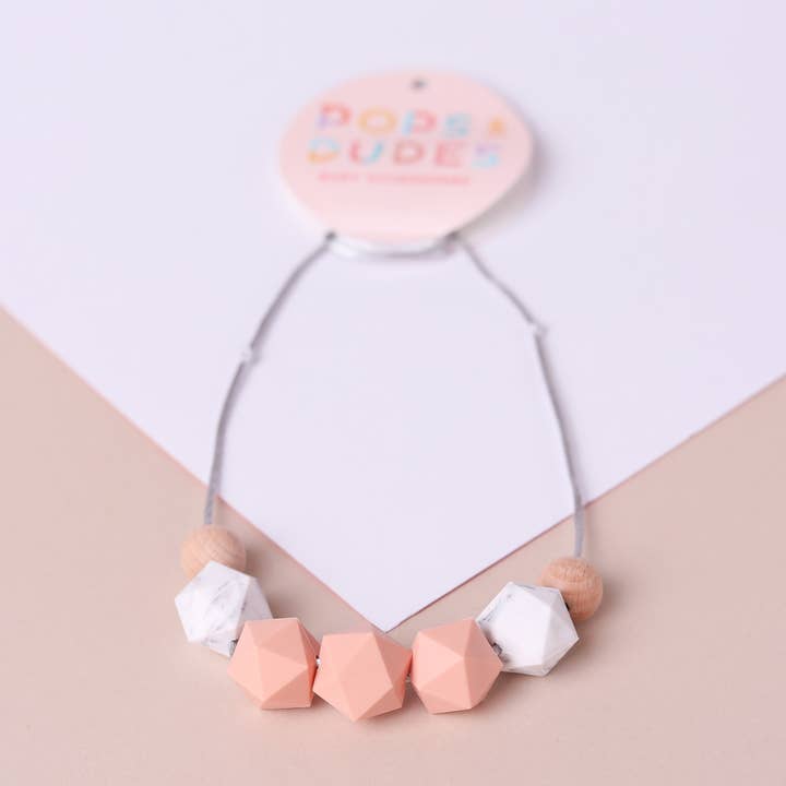 Peach marble teething necklace for wholesale by Pops and Dudes