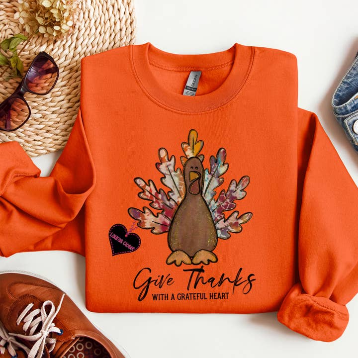 Maglietta grafica "Ringrazia con un cuore grato" con tacchino per la vendita all'ingrosso da parte di Lauras Closet