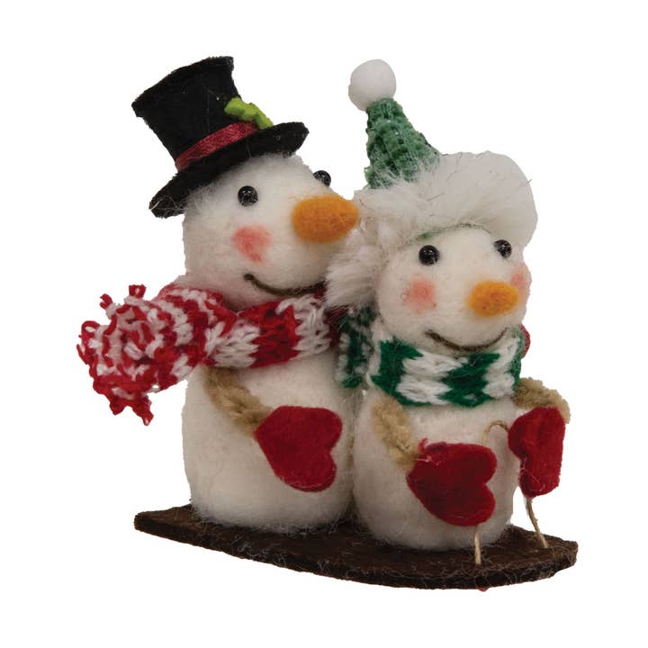 Decorazione natalizia in feltro a forma di pupazzo di neve con slittino per la vendita all'ingrosso da parte di Bright Ideas