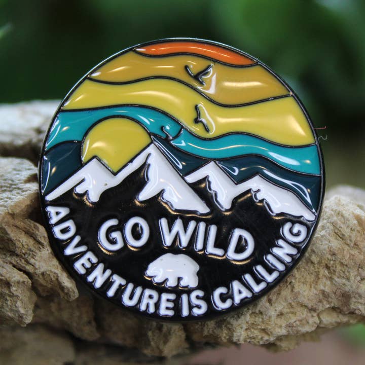 Go Wild, Adventure is Calling Enamel and Metal Pin for wholesale by National Parks and Beyond