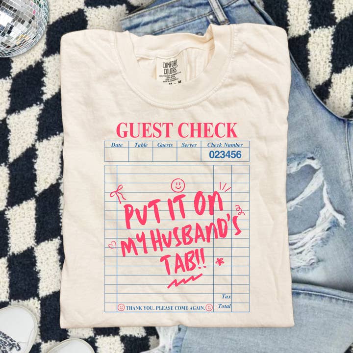 Put it on my Husbands tab Tee for wholesale by Rowdy Rascal Boutique LLC