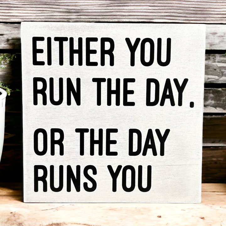 Either You Run the Day or the Day Runs You- Rustic Wood Sign for wholesale by Inkwood Crafters