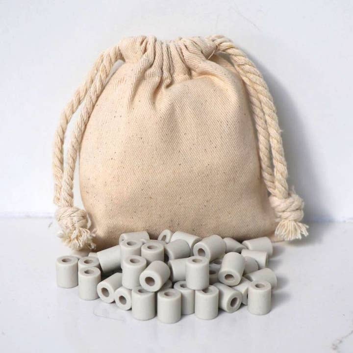 Purifying Ceramic Beads With Pouch - 50 Beads for wholesale by Osenteur