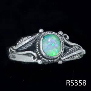 Zeppo Merchandisers Inc - Wholesale Band/Stacked Ring - Sterling Silver Bezel Feather with Blue Synthetic Opal Ring