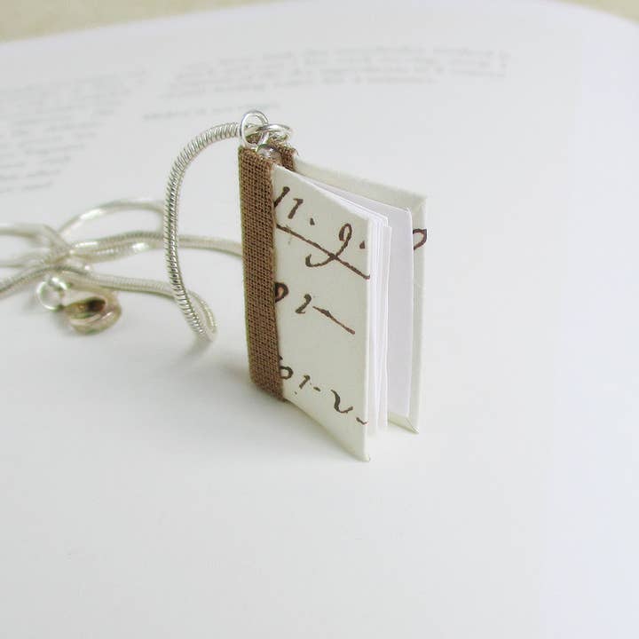 Italian Writings Book Pendant- silver for wholesale by Nicolette Tallmadge Designs