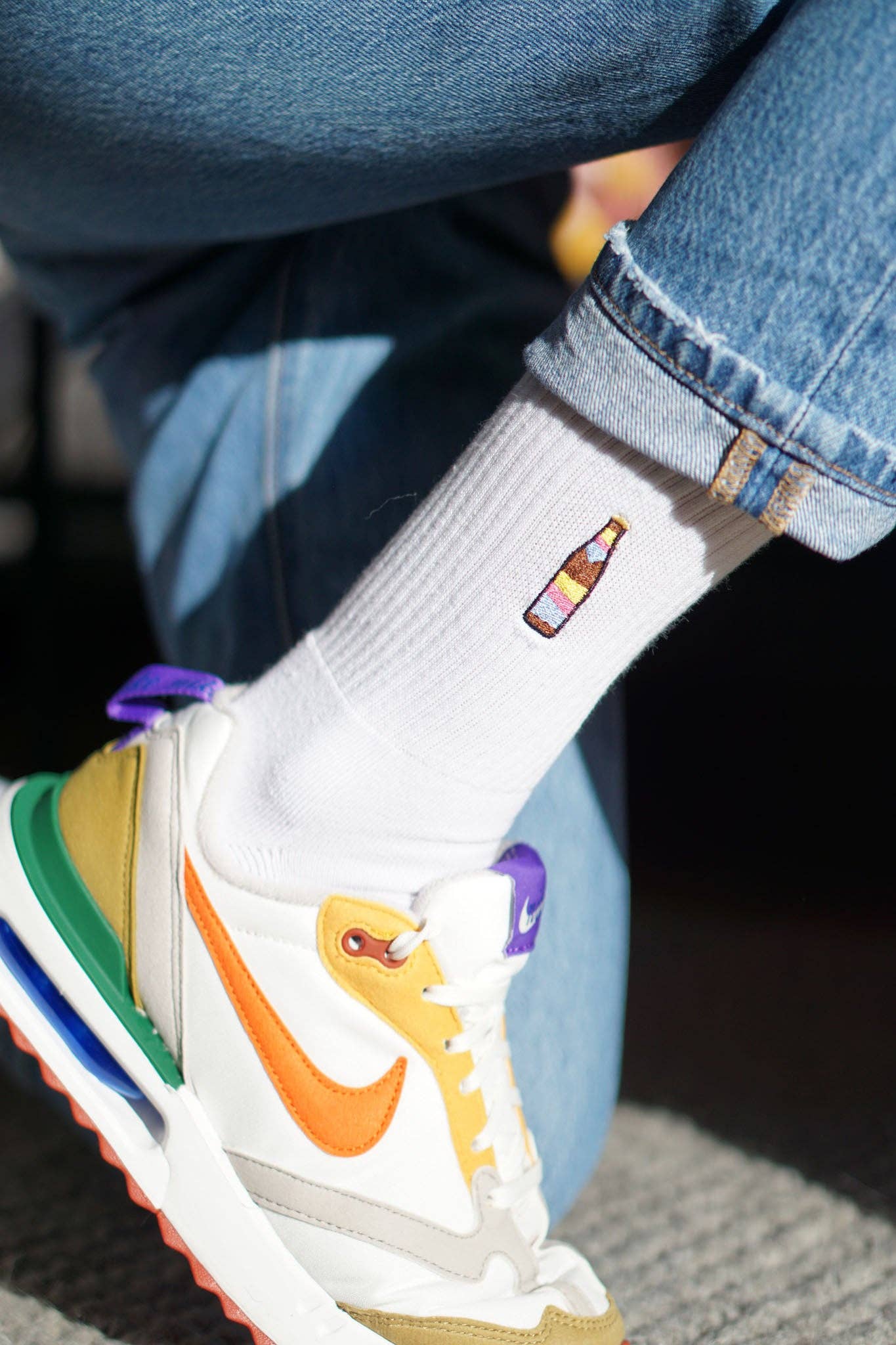 white Cola Mix | Embroidered organic cotton socks for wholesale on Faire1