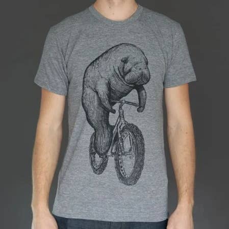 Manatee on a Bicycle Unisex Tee for wholesale by Dark Cycle Clothing
