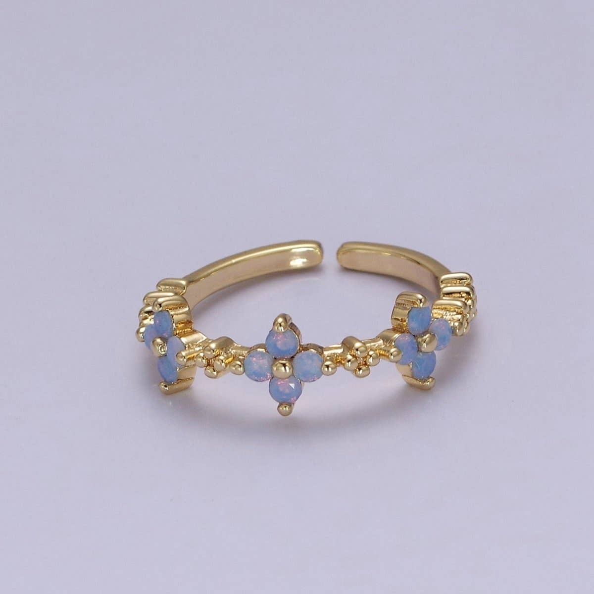 Aim Eternal - Vente Bague avec plusieurs pierres - Bague fine fleur en opale bleue avec anneau ouvert ajustable en or rempli pour bijoux minimalistes O20790