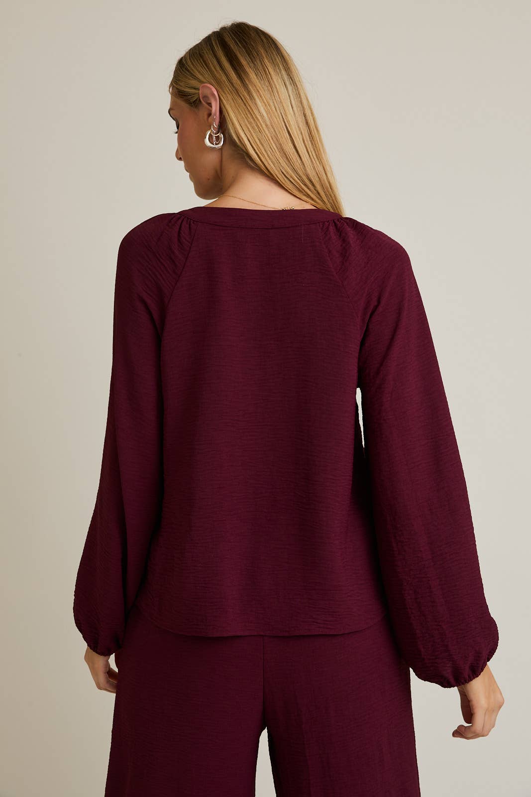 WINE FRONT TIE LONG SLEEVE TOP for wholesale on Faire2