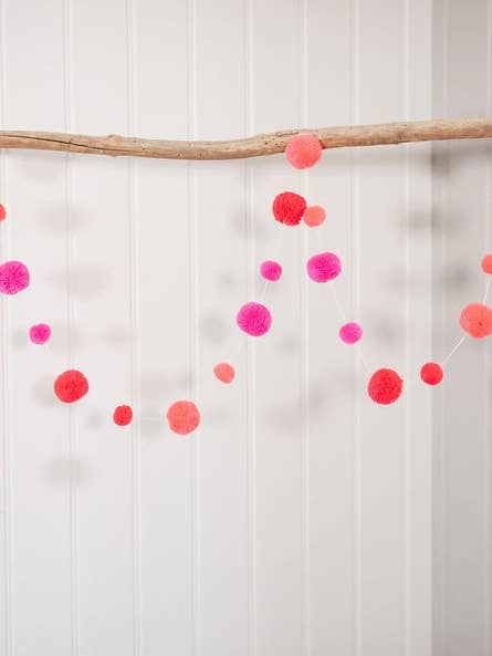 Flamingo Pink Pom Pom Garland for wholesale by PomPom Galore