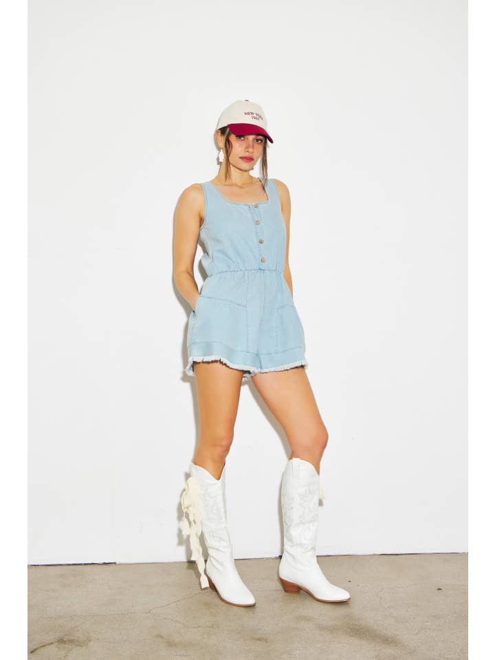WASHED DENIM ROMPER WITH DISTRESSED DETAILING for wholesale on Faire