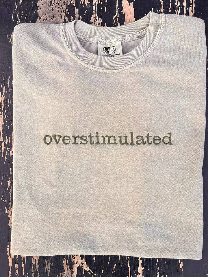 THE LATTIMORE CLAIM - Wholesale Screen Printed T-Shirt - Women's - Overstimulated Embroidered Comfort Color Khaki Tee