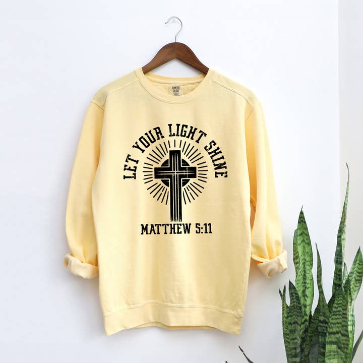 Let Your Light Shine Cross | Garment Dyed Sweatshirt for wholesale by Uplifting Threads Co Wholesale