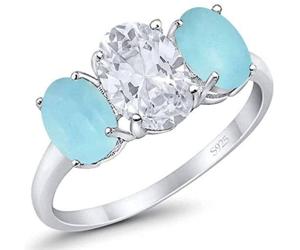 3-Stone Oval Simulated Larimar Center Stone Clear CZ Fashion Ring for wholesale on Faire1
