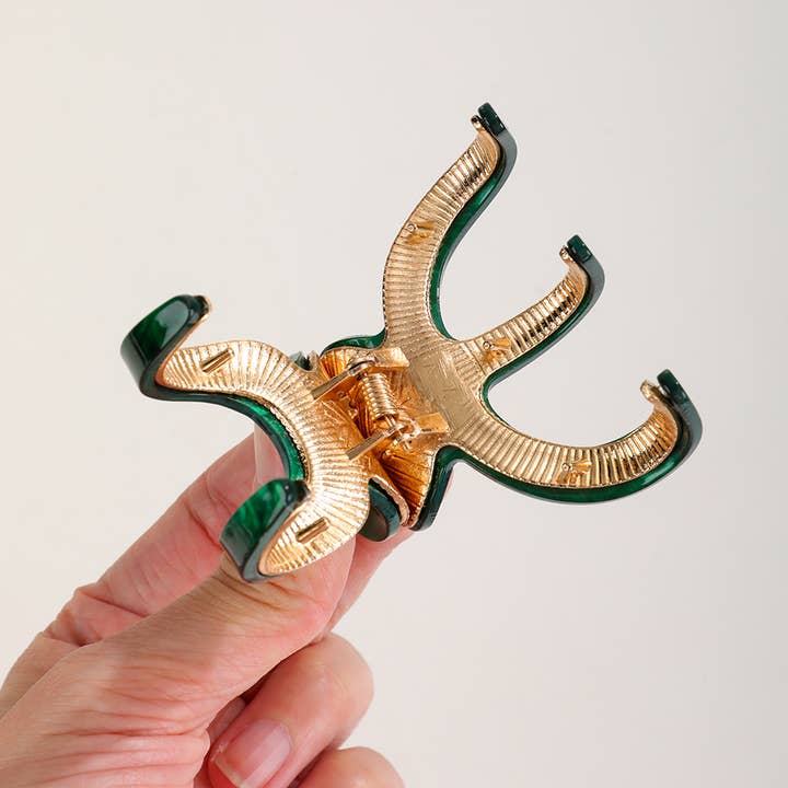 Assorted Jade |Â Small Octopus Metal Claw Clip for wholesale on Faire