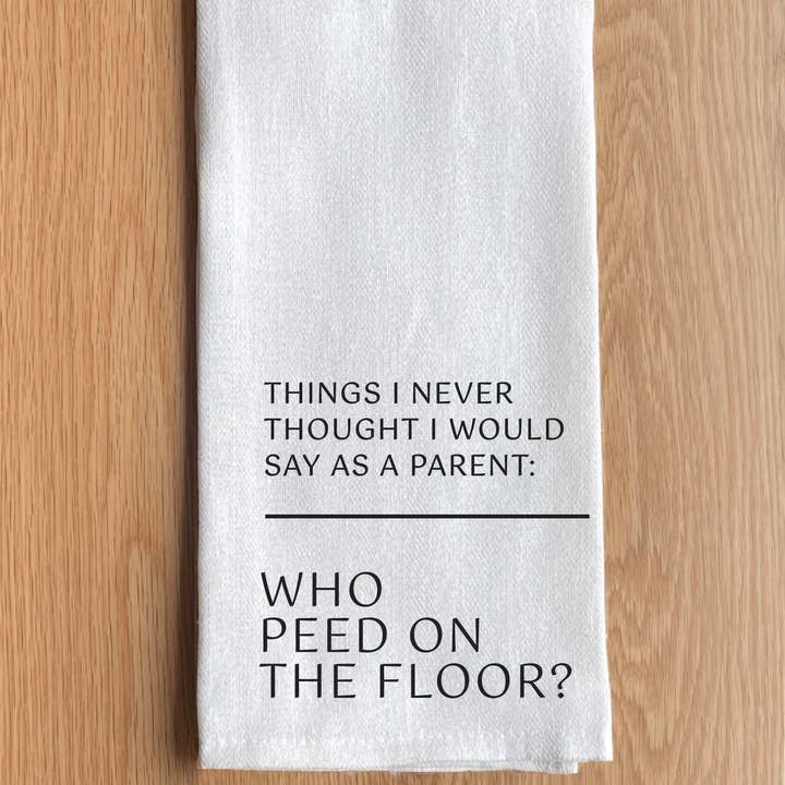 … Who peed on the floor? White Kitchen Towel for wholesale by Second Nature by Hand