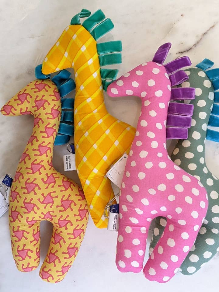 Cotton Ribbon Giraffe Stuffed Toy for wholesale by Curiosity