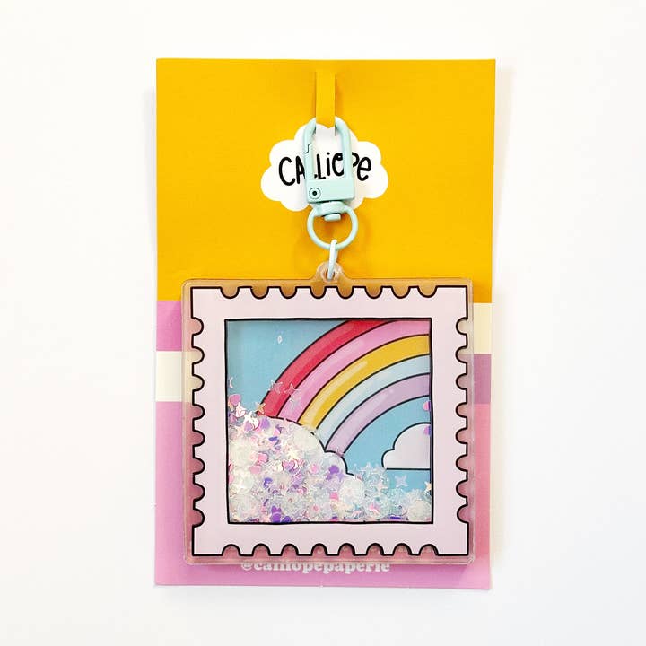Regenbogen-Stempel-Glitzer-Shaker-Schlüsselanhänger-Taschenanhänger für den Großhandel von Calliope