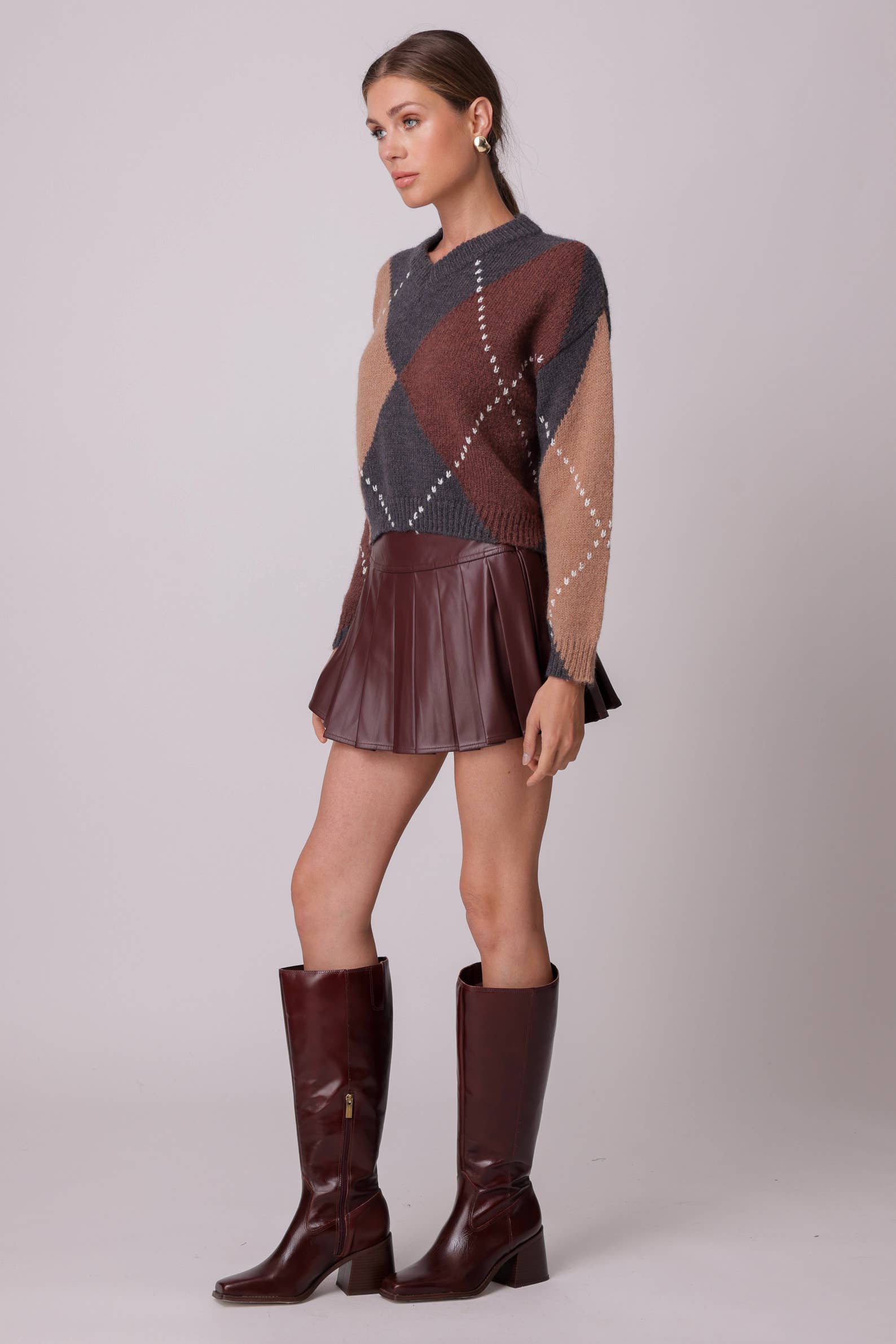 SANGRE DE BUEY FALDA PLISADA KEIKO de venta al por mayor en Faire2