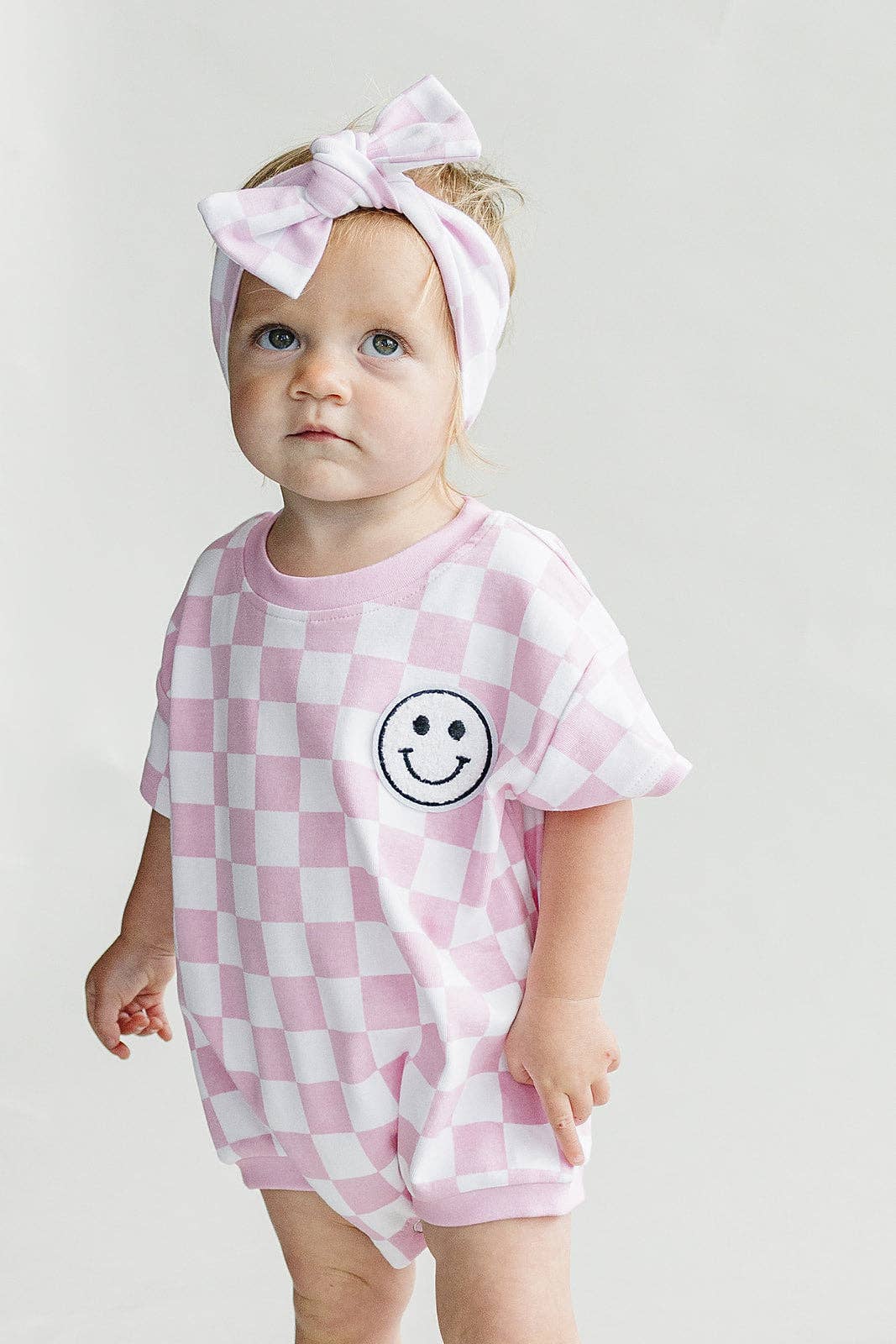 Lucky Panda Kids - Wholesale Bodysuit (Non-Footed) - Baby - Short Sleeve Bubble Romper | Checkered Smiley Pink3