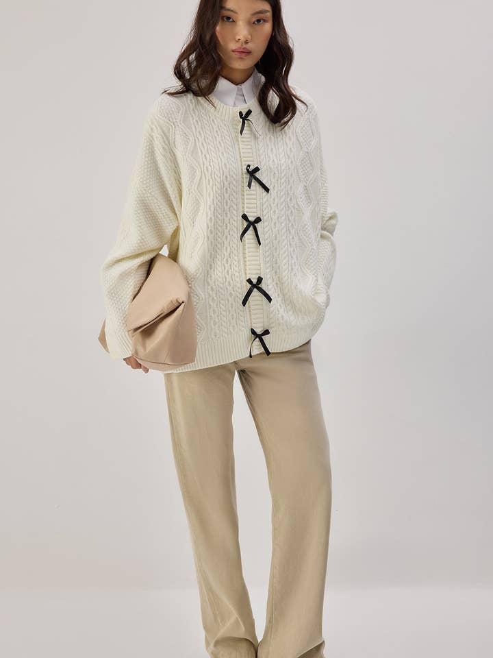 CARDIGAN IN MAGLIA CON DETTAGLI A FIOCCO per la vendita all'ingrosso da parte di Touché Privé