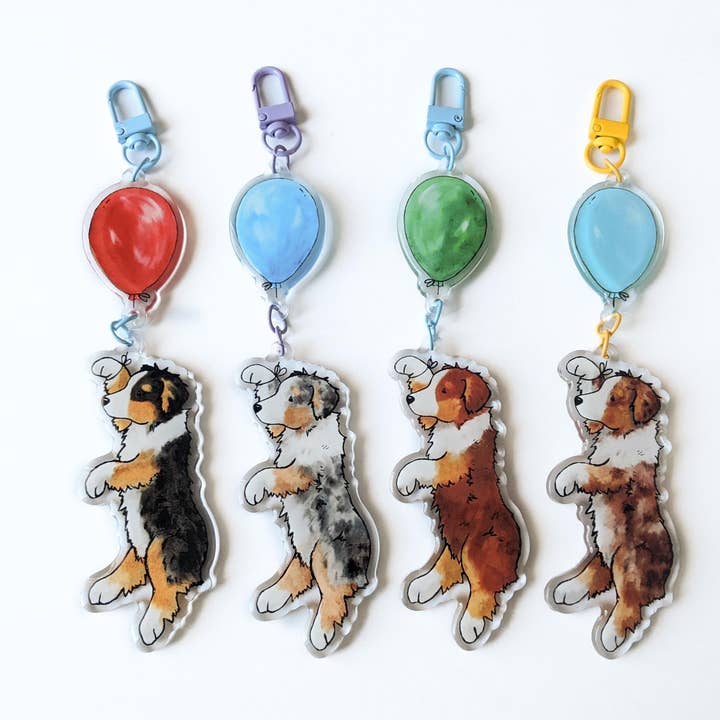 Acrylic Aussie Keychain, Aussie with Balloon, Australian Shepherd Gift, Red Merle, Tri, Blue Merle for wholesale by Jasper and Ruby