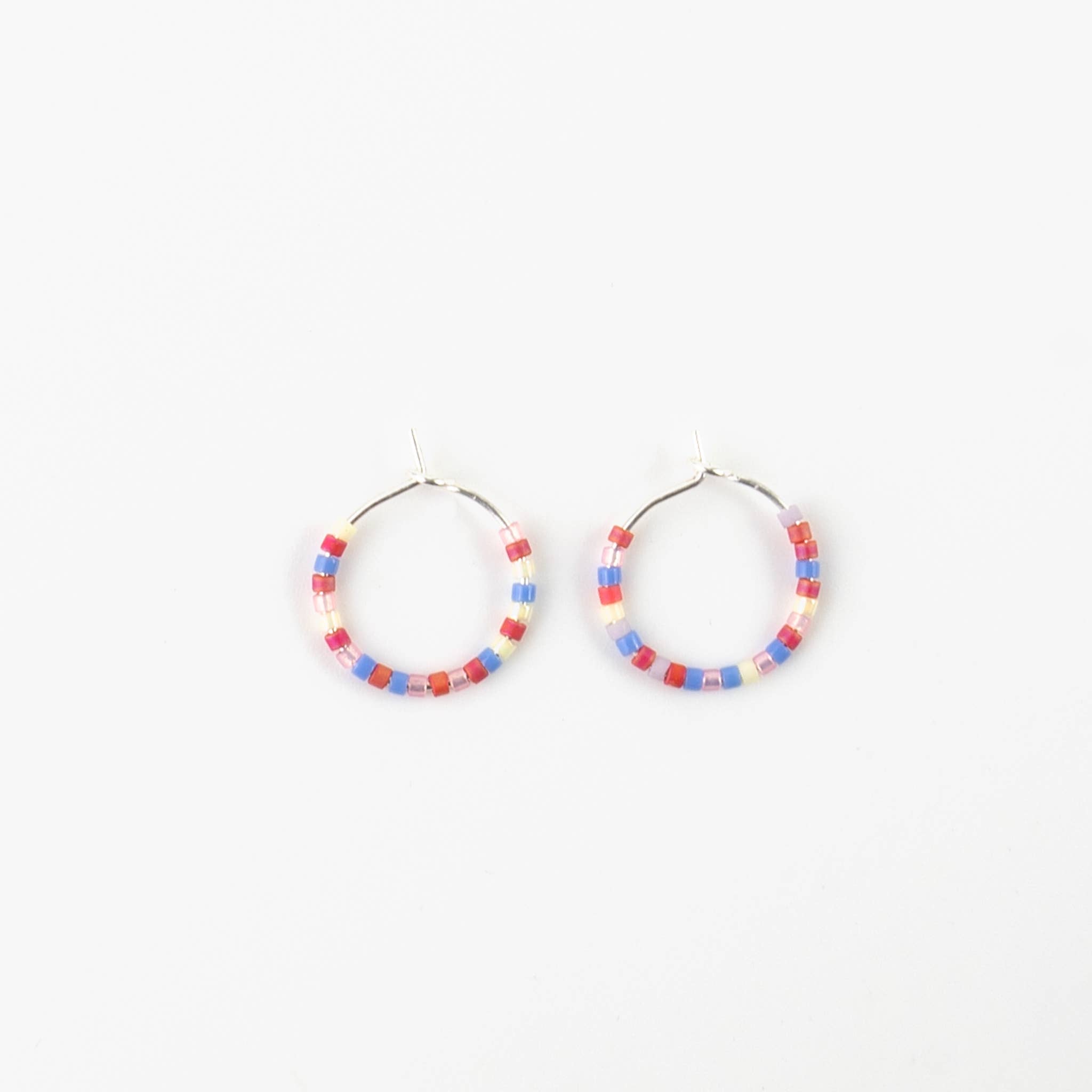 Rosa Riffstrand Perlenohrringe für den Großhandel auf Faire1