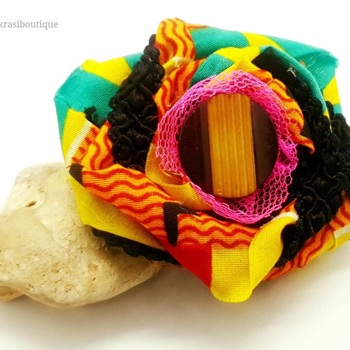 African wax print flower with buttonCJURDVRLDNZOLE4Z6GEPY7MD for wholesale by Akrasiboutique