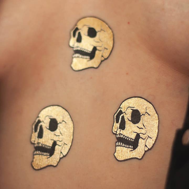 Tatuaggio GOLDEN SKULL (confezione da 2) per la vendita all'ingrosso da parte di Tattoonie