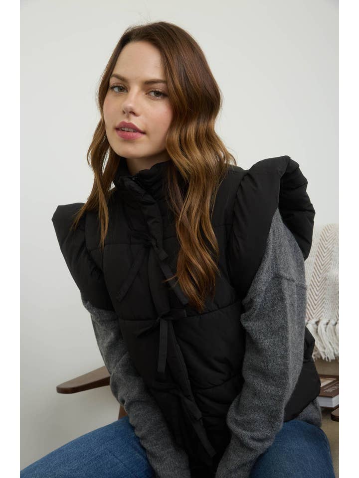 MINE - Wholesale Outerwear Vest - Women's - FLUTTER SLEEVE BOW DETAIL ZIP-UP PUFFER VEST24