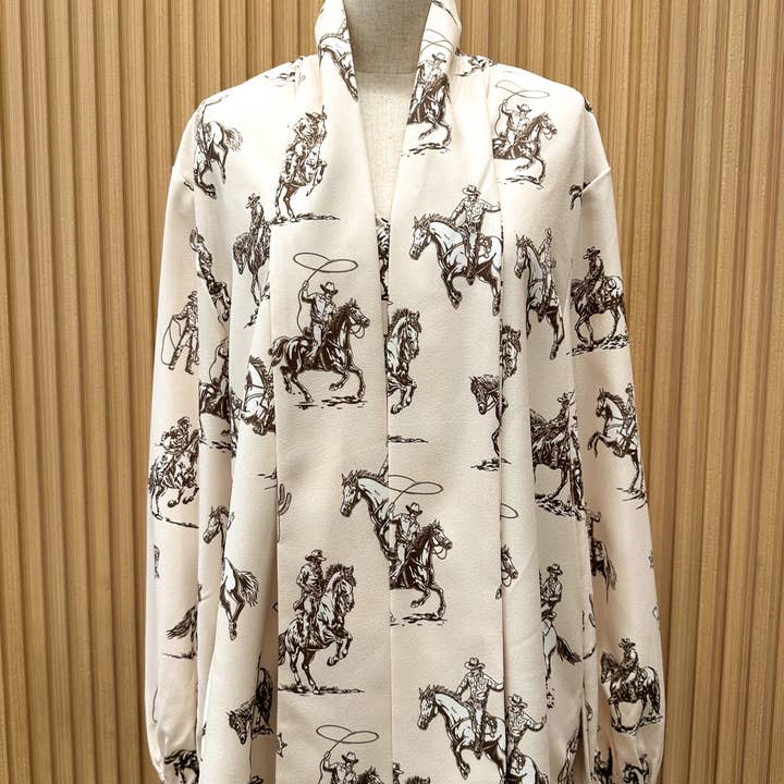 T1629-5302-Western Sheriff Cowboy Print Blouse and other Purchase Wholesale women's apparel. Free Returns & Net 60 Terms on Faire trending on Faire.