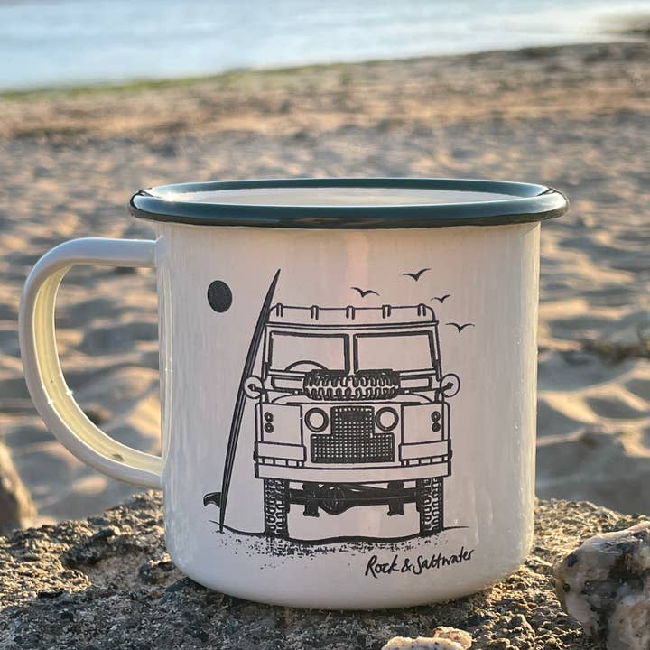 Land Rover front view with surfboard on beach enamel mug for wholesale by Rock & Saltwater