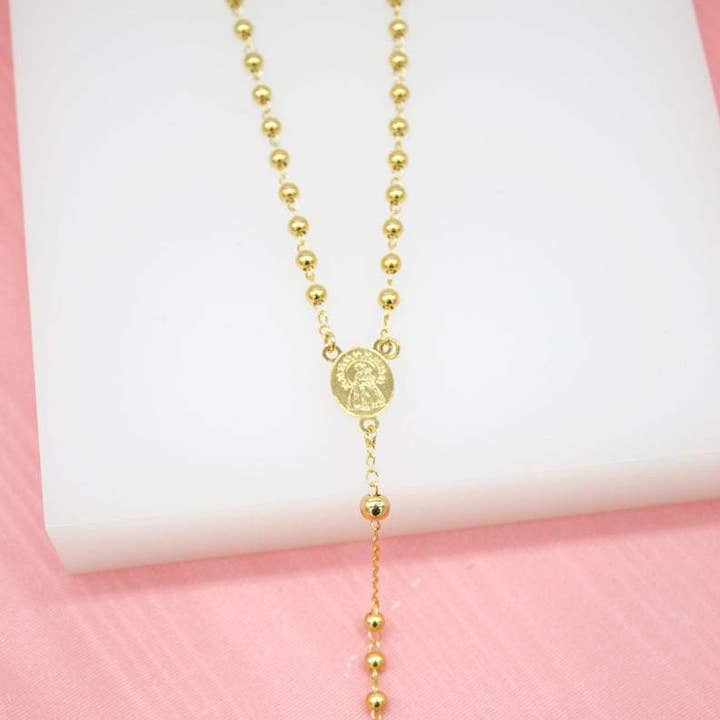 18K Gold Filled Caridad Del Cobre Gold Bead Rosary With Jesus Crucifix for wholesale by MIA Jewelry