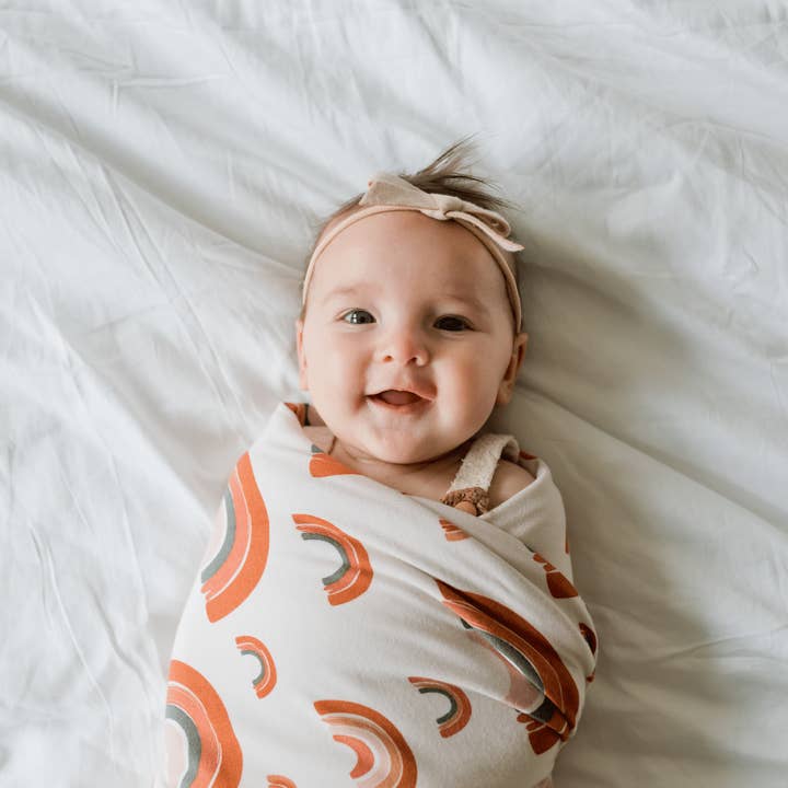 Newborn Swaddle Blanket Wrap, Boho Modern Rainbow Soft Knit for wholesale by Pipermoon