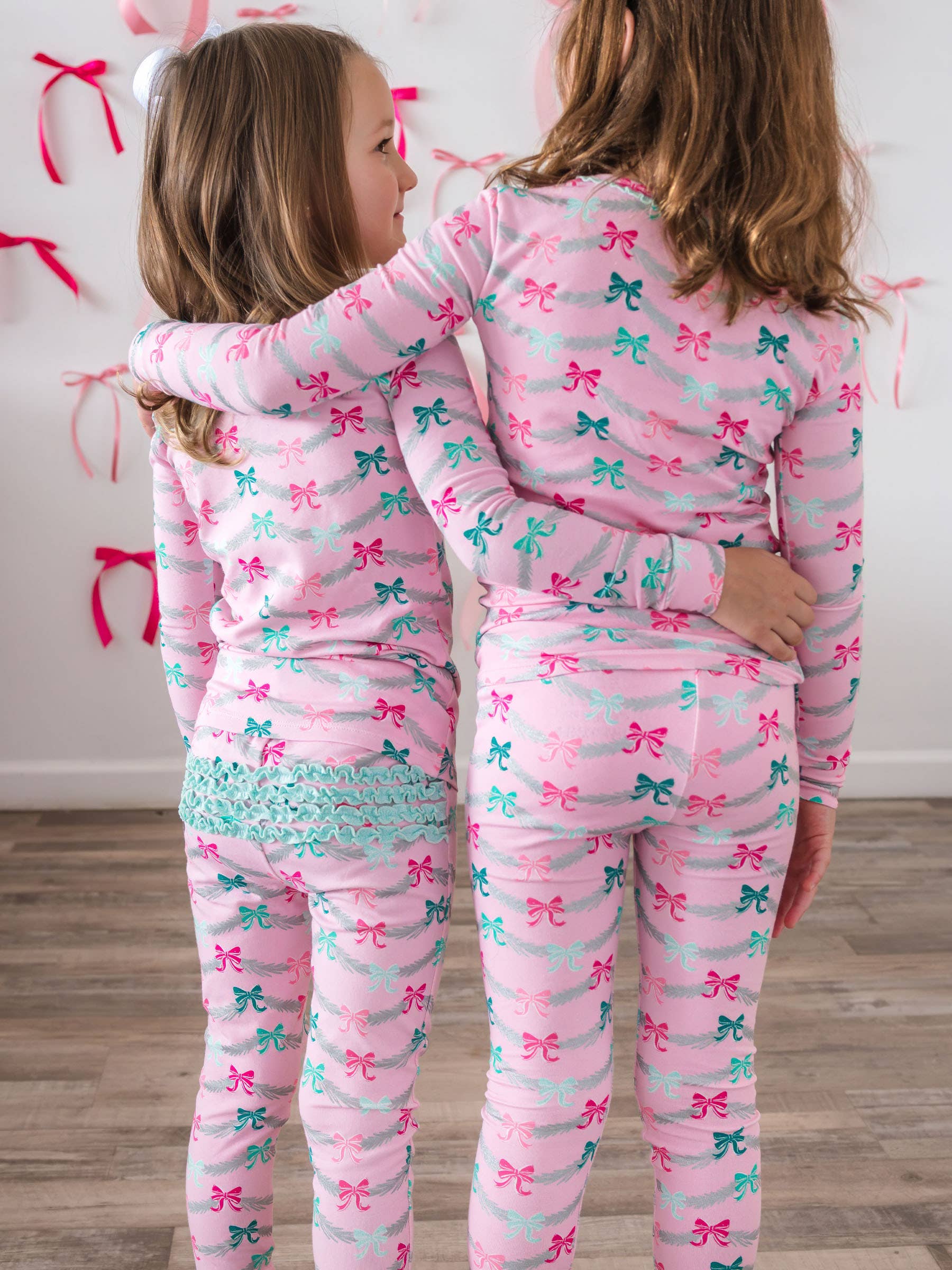 SoftSnooze™ Toddler Girls Cotton Modal Sparkle Pink Tinsel Tidings Ruffle Long Sleeve Pajama Set with Signature Rear Ruffles for wholesale on Faire1