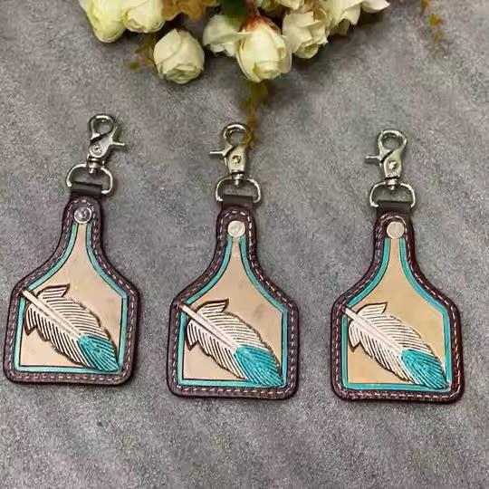 Saddle Vixens - Vendita all'ingrosso Portachiavi - Donna - Portachiavi con etichetta a forma di mucca leggera come una piuma