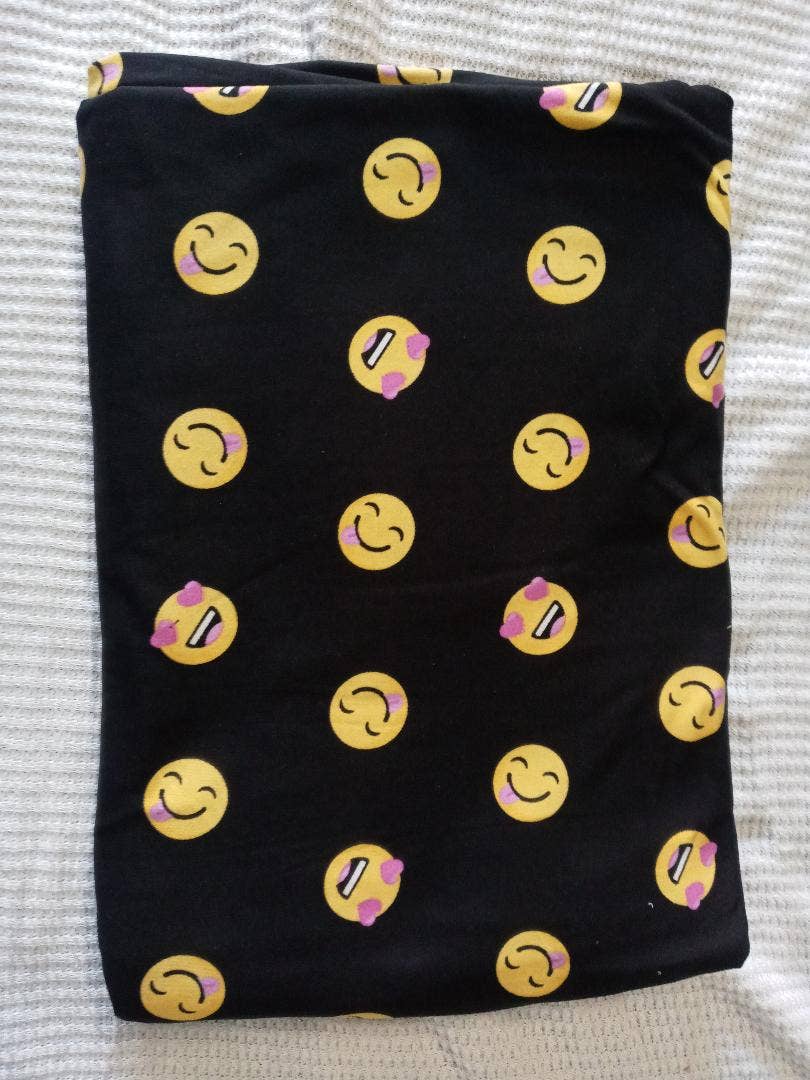 Cutting Edge Trade - Wholesale Fabric - Smile Face on Black Double Brushed Poly Lycra Jersey Knit0